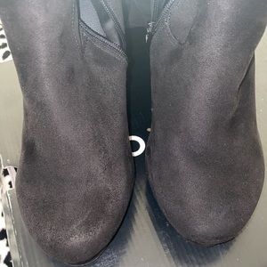 Over the knee high heeled boots